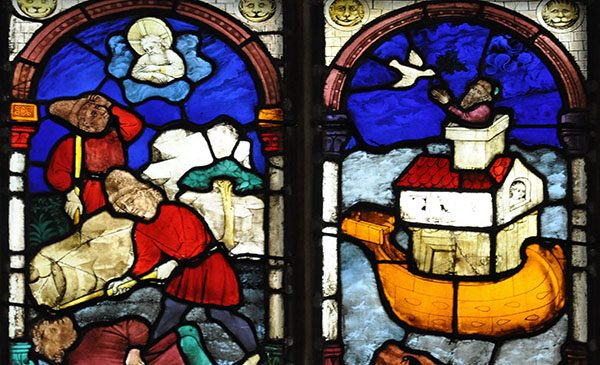 Stained glass window depicting two biblical scenes - Cain and Abel, and Noah and the Ark. Public domain image from Wikimedia Commons.